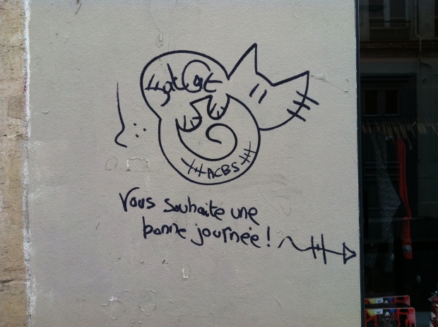 "FatCat wishes you a good day," signed ACBS. Rue de Charonne, Dec 12 '12.